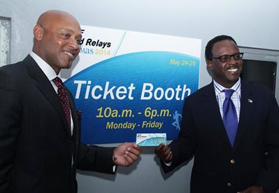 WORLD RELAYS A HUGE GO By Stirling Strachan Bahamas Information Postal Bahamas Information Servicess  Nassau, The Bahamas -- Minister of Youth, Sports and Culture Dr. Daniel Johnson purchased the first two gold tickets February 13 to get sales rolling for the May 24 and 25 International Association of Athletic Federations (IAAF) World Relays Bahamas 2014 at the Thomas A. Robinson Stadium. The Local Organising Committee (LOC) also announced that there were 100 days left before the relays are held and that thousands of tickets; gold $50, silver $35, bronze $20 reserved seating and general admission $10 and $5 for persons 12 and under are now on sale and can be purchased at the box office at the stadium or online at www.bahamasworldrelays.org.  During the press conference the LOC unveiled its ticketing layout and logo. The Caribbean Bottling Company, distributors of Coca-Cola; the John Bull group of companies and Atlantic Medical Insurance Co. Ltd. were named as three of the six national partners. The Broadcasting Corporation of The Bahamas (BCB) was named the local broadcaster. Caption:  Minister of Youth Sports and Culture Dr. Daniel Johnson (right) accepting his tickets (the first two gold sold) from Local Organising Committee managing director Lionel Haven on Thursday, February 13 at the box office at the Thomas A. Robinson Stadium for the Bahamas Relays 2014. (BIS Photo/Derek Smith)