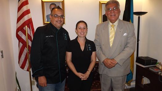 Photo: NEW YORK -- Chef Tim Tibbetts, Executive Chef and Owner of Flying Fish Restaurant in Freeport, Grand Bahama,  along with his wife, Mrs. Rebecca Tibbetts, Co-owner and General Manager Flying Fish Restaurant, paid a courtesy call on the Hon. Forrester J. Carroll, Bahamas Consul General to New York, on Friday, July 11, 2014, at Bahamas House, 231 East 46th Street. The restaurateurs were on a brief tour of New York making stops at the James Beard House, showing their talents at the “Sustainable Seafood Celebration” and Food and Wine Magazine. The AAA 4 Diamond Award winning team is making waves in the culinary world. Pictured from left to right are Chef Tibbetts, Mrs. Tibbetts and Consul General Carroll.