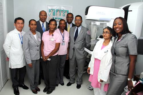 Photo: Grand Bahama Island – The Bahamas is the only nation in the region equipped with a digital mammogram machine to allow for the early detection of breast cancer.  Health Minister, Dr. Perry Gomez, made that observation Oct. 24, 2013 at the commissioning of the new Hologic Selena Dimensions Digital Mammography Machine, at the Rand Memorial Hospital.  This is the second such machine in The Bahamas.   Dr. Gomez just recently commissioned similar equipment at the Princess Margaret Hospital.  Speaking to a gathering of health officials, insurance executives, breast cancer survivors and other invited guests in the Foyer of the Rand Memorial Hospital, Dr. Gomez noted that the government's Charter for Governance, identified the need to acquire needed cancer screening technology, at both the Rand Hospital and the Princess Margaret.  He pointed out that breast cancer is the most common cause of cancer related deaths for women worldwide, and is the number one killer in females in The Bahamas.  Dr. Gomez also informed that another area that they have put on the agenda for women’s health is acquiring the HPV vaccine.  He explained that it is an expensive vaccine that is now available in the private sector of the medical practice in The Bahamas, and is only available in that sector because of the cost associated with the medicine.  Dr Gomez said the Pan American Health Organisation has been approached to help in the acquisition of the HPV vaccine, through the revolving fund of PAHO, where the vaccines are obtained at discounted prices.  “It is through this particular fund that the success in preventive medicine throughout this hemisphere is attributed,' said Dr. Gomez. He said the PAHO revolving fund makes the vaccine cheaper and affordable to developing countries like The Bahamas.